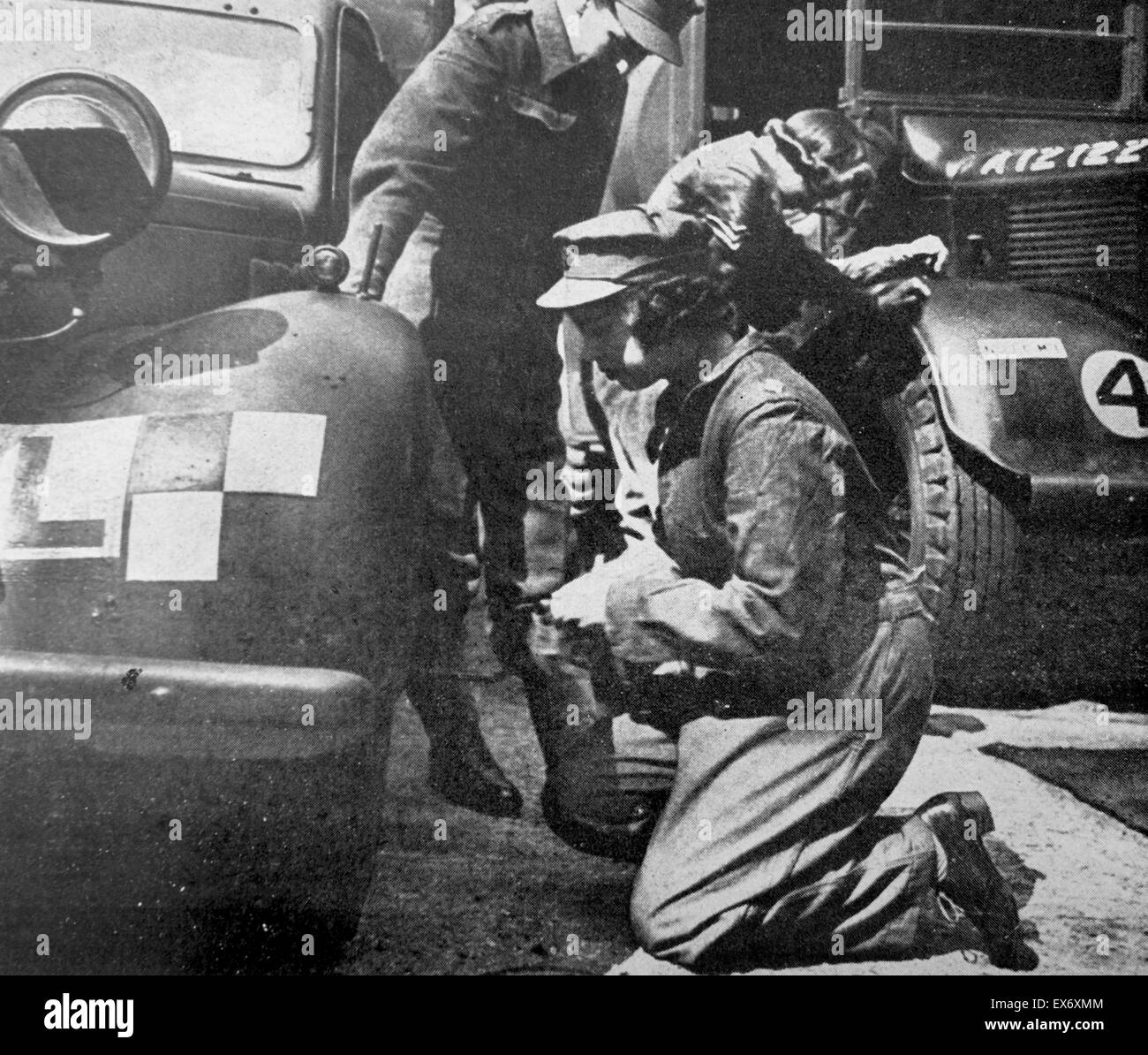 Princess (later Queen ) Elizabeth of Great Britain doing technical repair work during her World war two military service 1944 Stock Photo