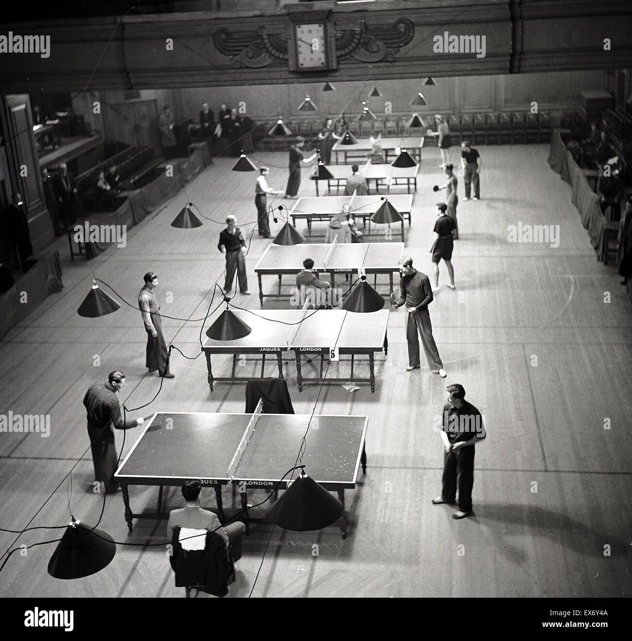 Historical, 1950s, people playing in a table tennis competition in a