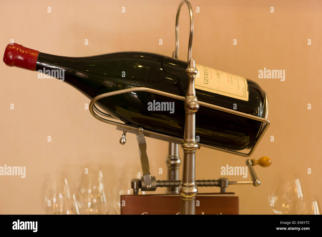 A Jeroboam of Gevrey Chambertin Wine in its lifting  cradle Stock Photo
