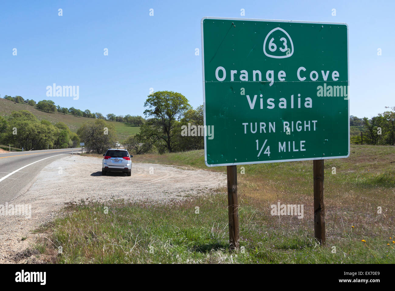 Sign for Route 63 Orange Cove Visalia on California State Route 180, East Kings Canyon Road, Sanger, California, USA. Stock Photo