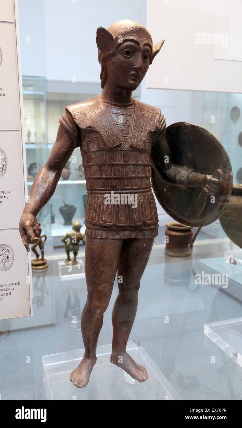 Etruscan, bronze votive statuette of a warrior with a shield, wearing