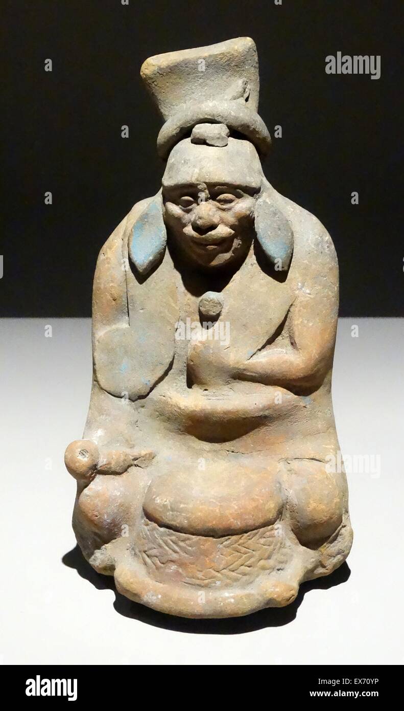 Mayan ceramic figurine of an old man playing a tambourine. From Jaina, Campeche, Mexico 600-900 AD Stock Photo