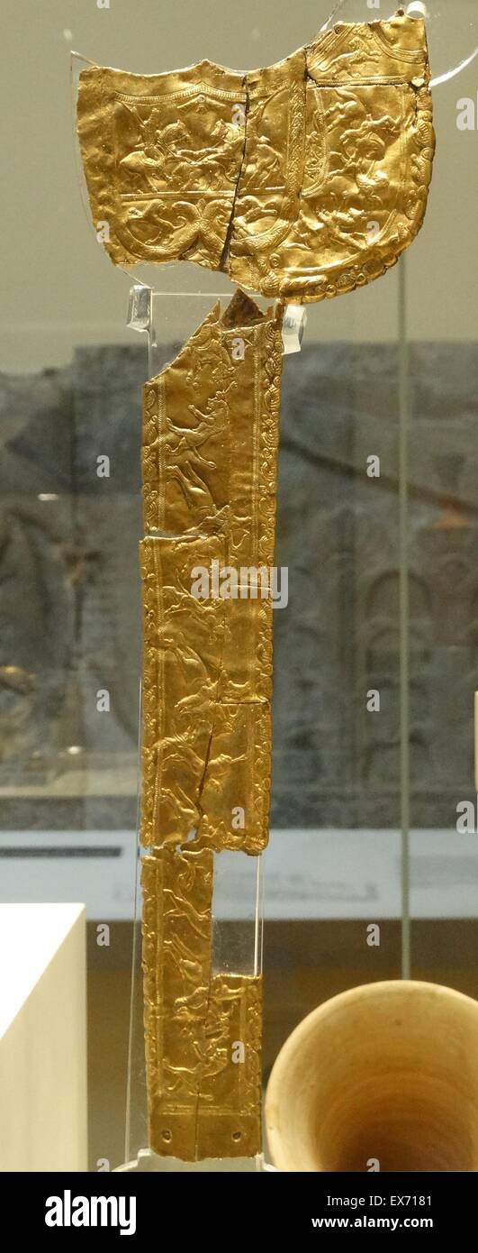 gold scabbard from the Oxus Treasure. The lion hunt scenes show riders in costumes resembling those of eastern Iranians from the provinces of Aria and Parthia. 5th—4th century BC Stock Photo