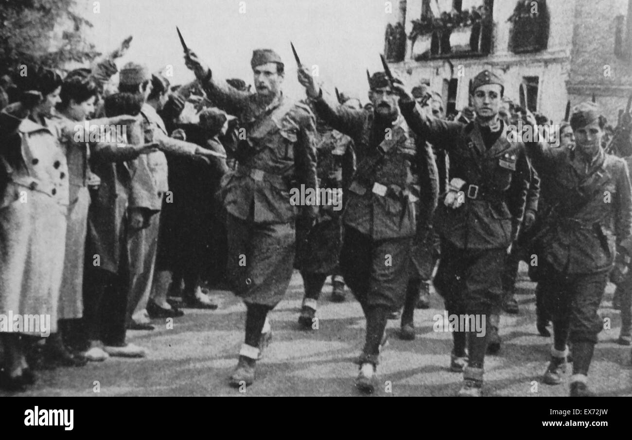 Italian Fascist soldiers march into a town in Spain during the Spanish Civil War Stock Photo