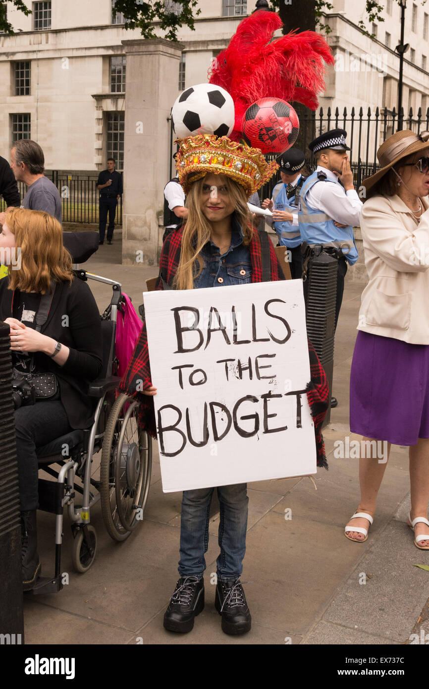 London, 08th July 2015. Protesters against Chancellor George Osbourne's budget come together in a demonstration they call 'Balls to the budget'. Anti-austerity and disability campaigners released multi-coloured balls into Whitehall outside Downing Street in protest at what they see as a budget which persecutes and demonises benefit claimants, then marched past Parliament and blocked Westminster Bridge Credit:  Patricia Phillips/Alamy Live News Stock Photo