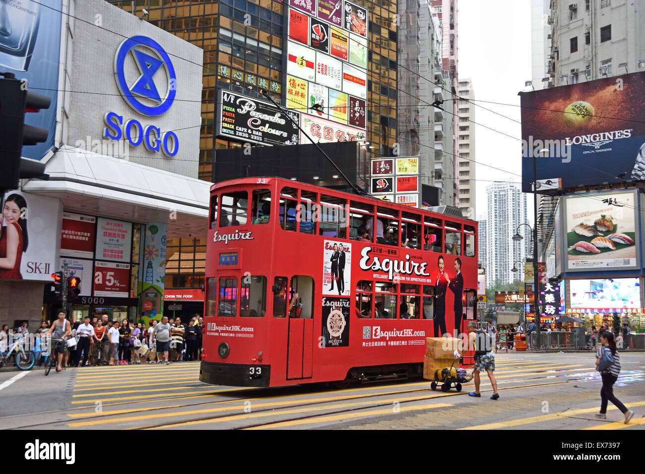 Double Deck Tram with tram body advertising Hong Kong China ( Busy Hong Kong Island ) Stock Photo