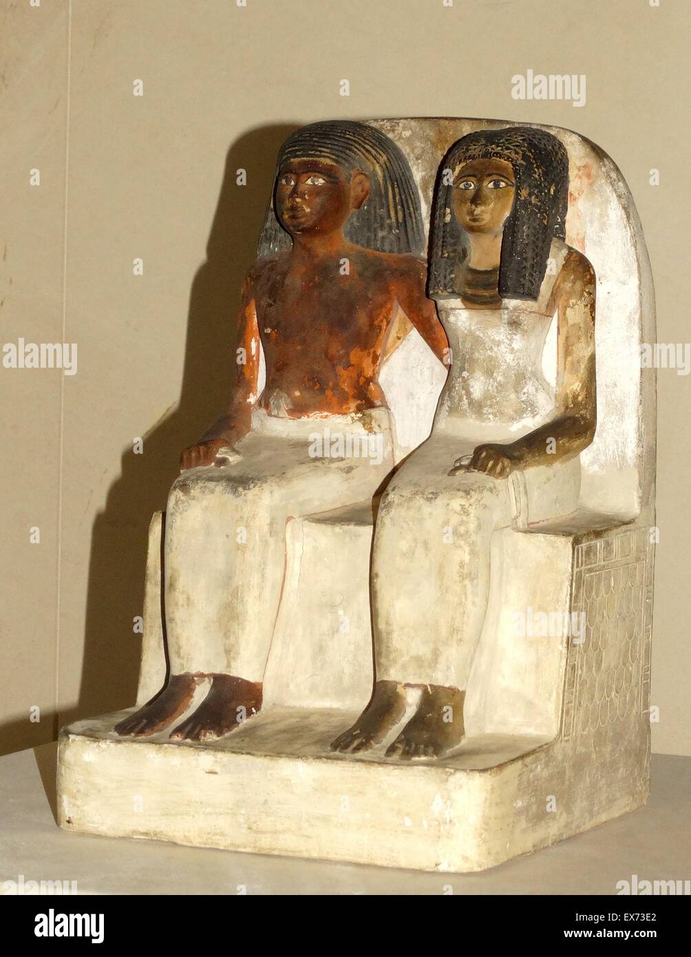 Painted limestone statue of an unnamed man and his wife from a tomb ...