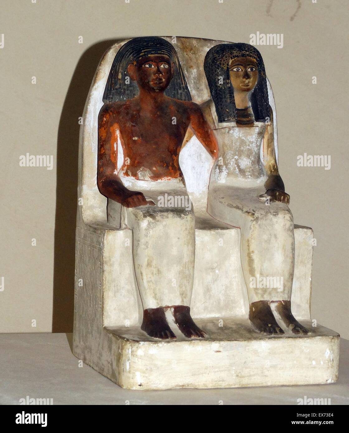 Painted limestone statue of an unnamed man and his wife from a tomb ...