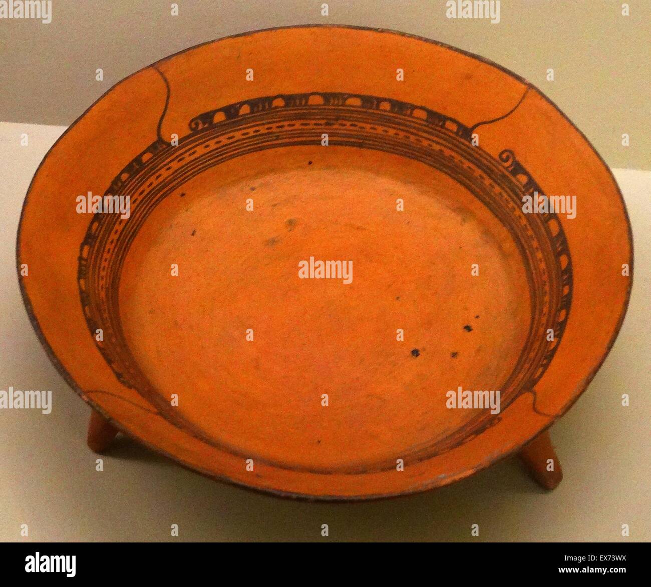 Tripod pottery plate, Aztec, Mexico AD 13001521. Blackonorange wares