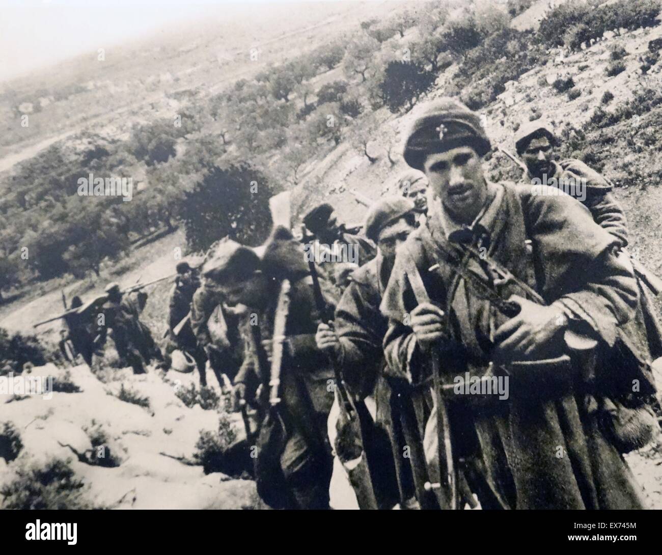 Nationalist soldiers pass through hills in Spain, during the Spanish Civil War Stock Photo