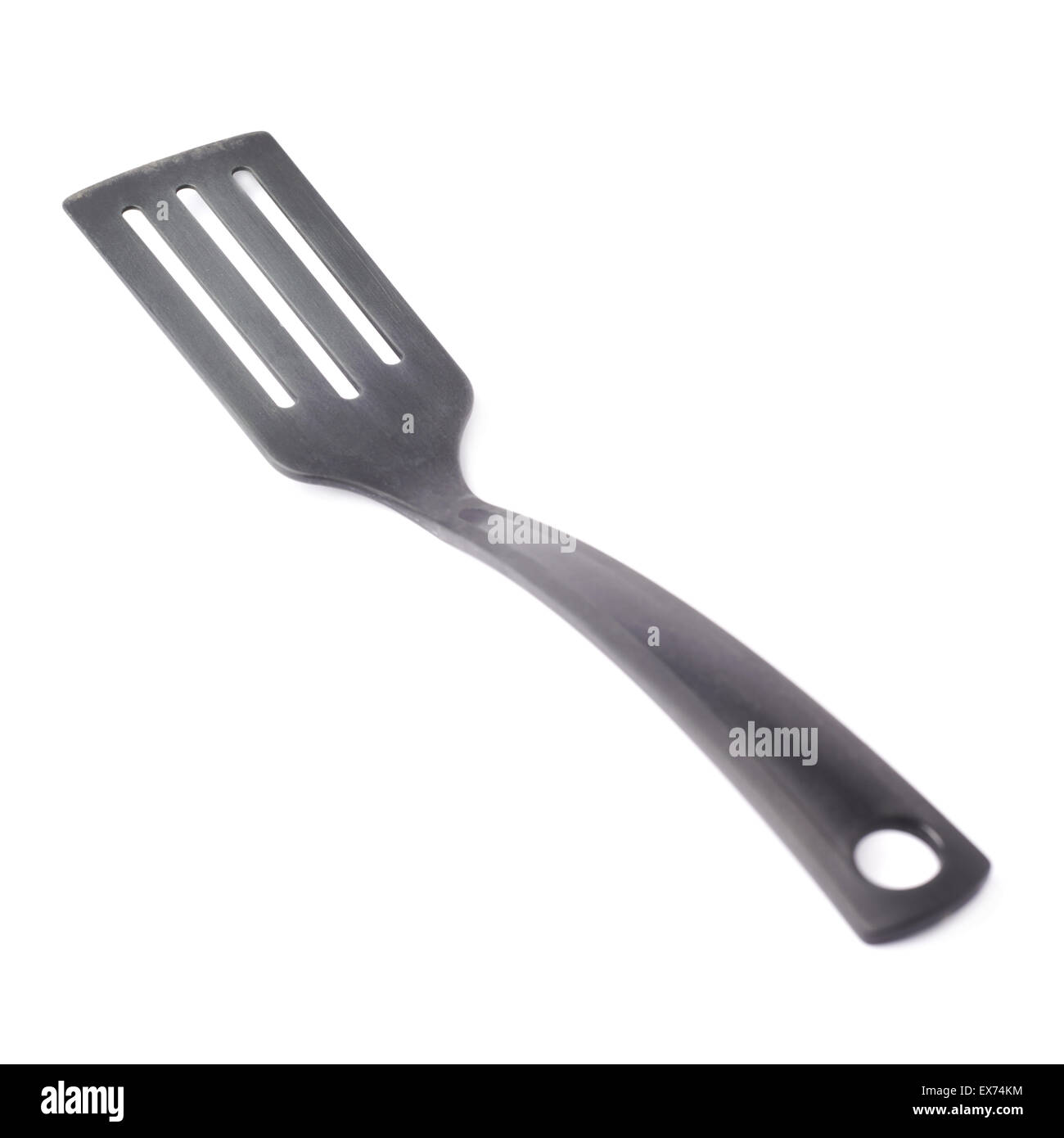 Used black plastic spatula isolated Stock Photo Alamy