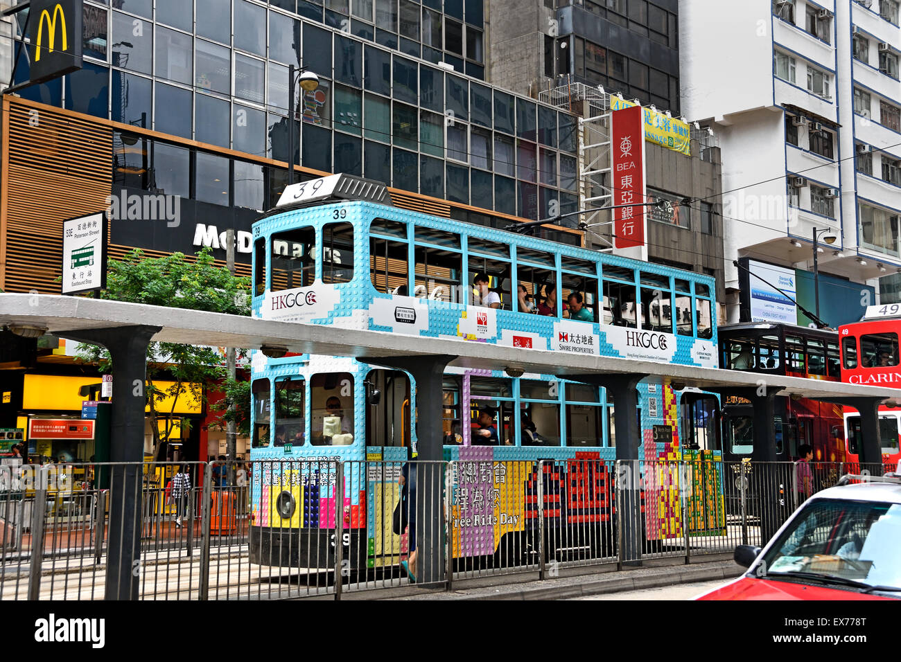 Double Deck Tram with tram body advertising Hong Kong China ( Busy Hong Kong Island )  Yee Wo Street / Hennessy Road Causeway Bay Hong Kong Island Stock Photo