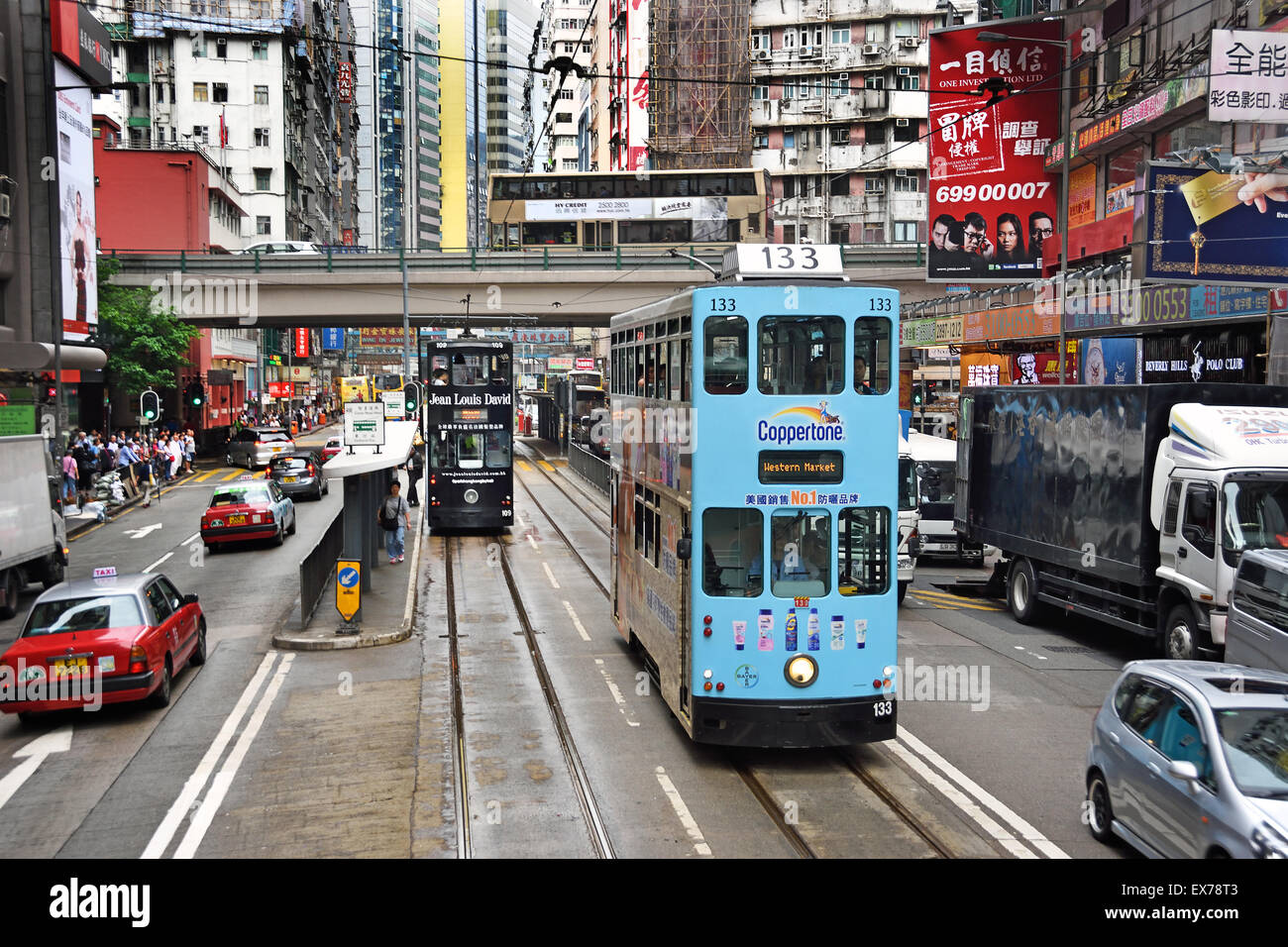 Double Deck Tram with tram body advertising Hong Kong China ( Busy Hong Kong Island )  Yee Wo Street / Hennessy Road Causeway Bay Hong Kong Island Stock Photo