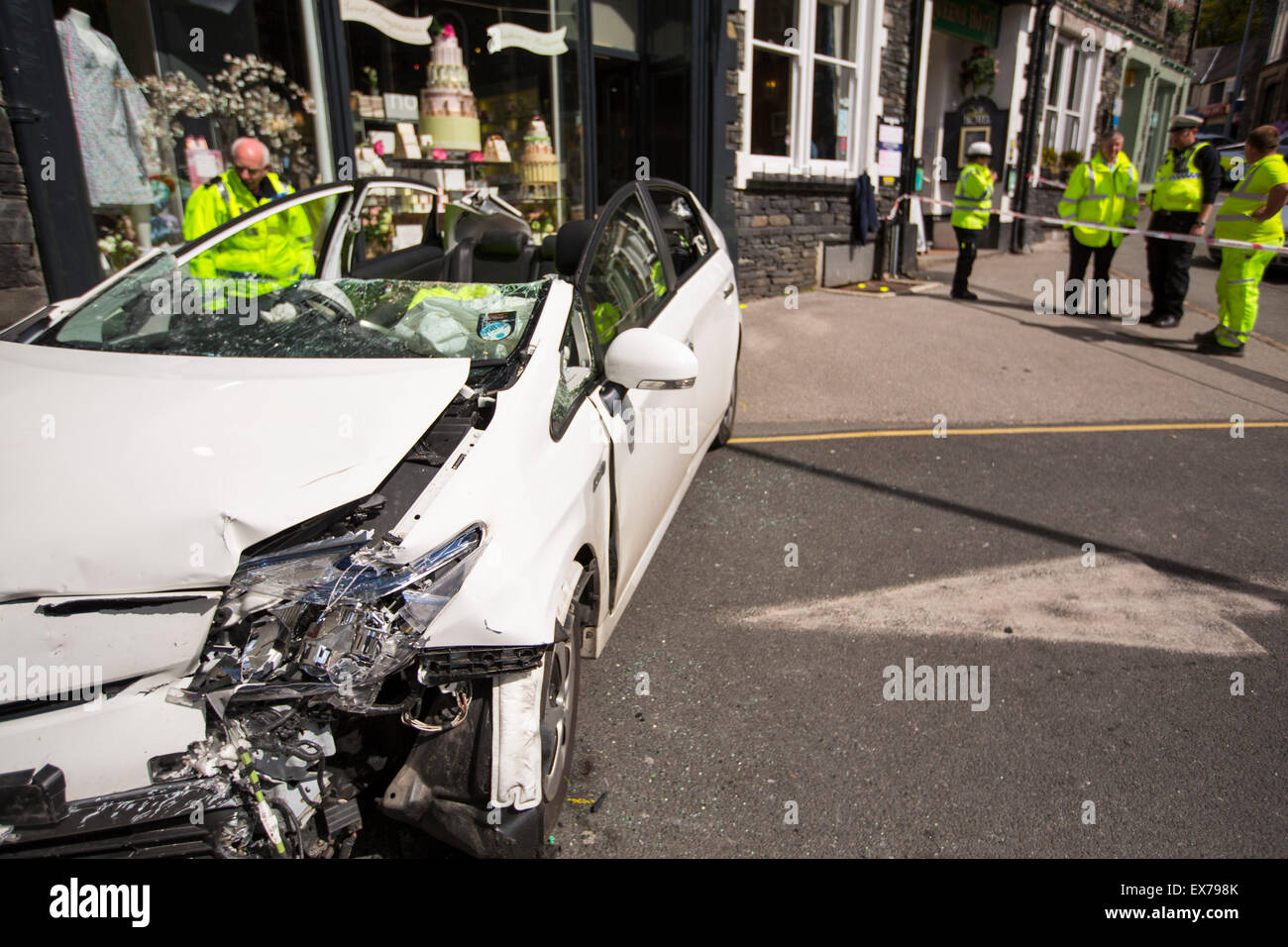 A car crash in Ambleside, UK, with the roof cut off the car to