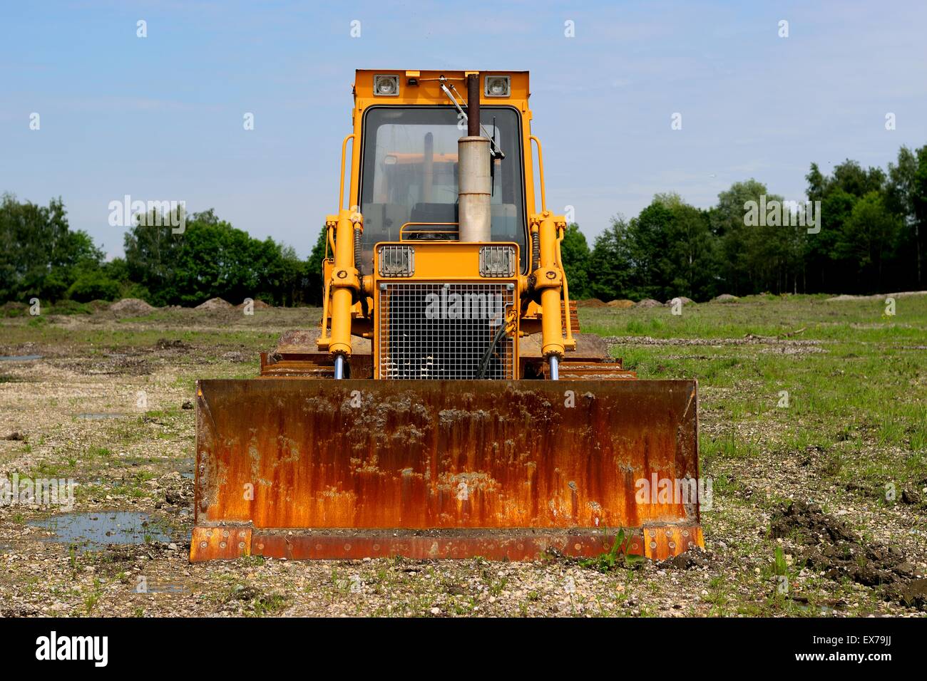 Small bulldozer in the field Stock Photo Alamy