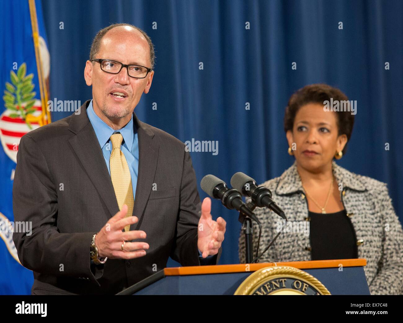 US Secretary of Labor Thomas Perez joins Attorney General Loretta Lynch to discuss ACTeam Phase II implementation in combating human trafficking during a press conference June 25, 2015 in Washington, DC. Stock Photo