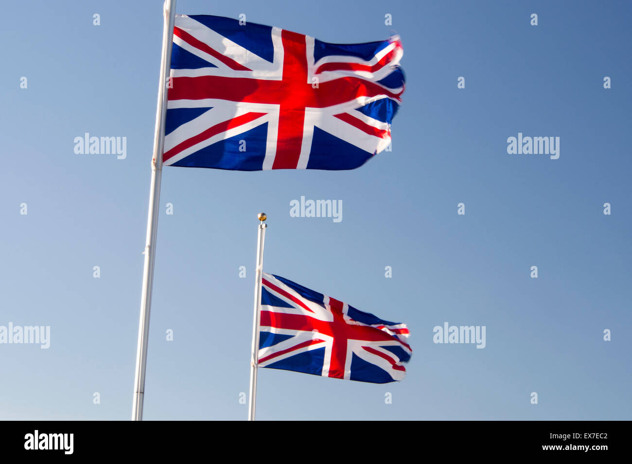 Union Jacks flying in a breeze. Stock Photo