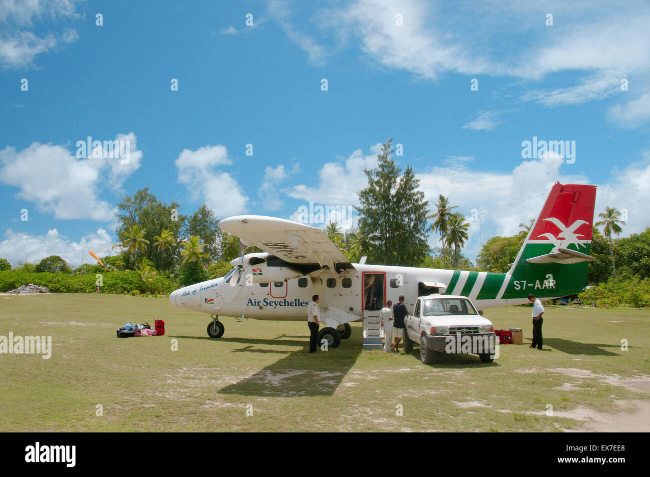 A small plane Seychelles airlines stands on the runway, Denis island, Seychelles Stock Photo