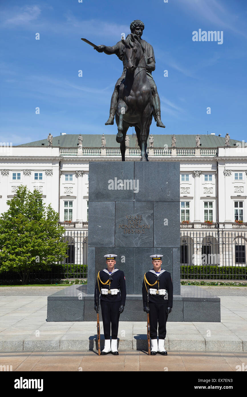 Poland, Warsaw, Old Town, Krakowskie Przedmiescie, Radziwill Palace Presidential Residence with guards in front of statue of Prince Jalzef Poniatowski. Stock Photo