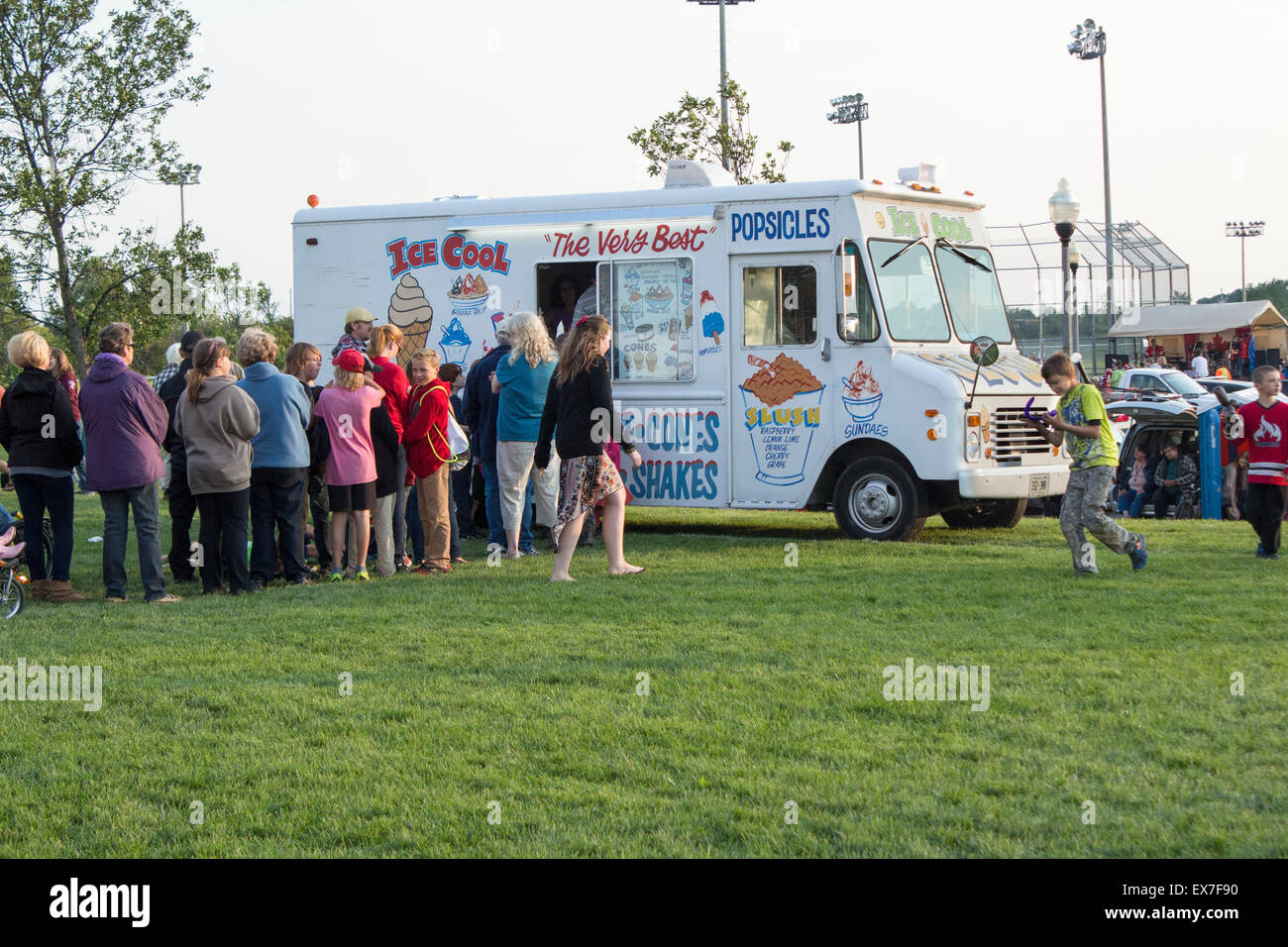 People line up for ice cream at an ice ream truck at Wilson Fields in Lindsay, Ontario on Canada Day Stock Photo