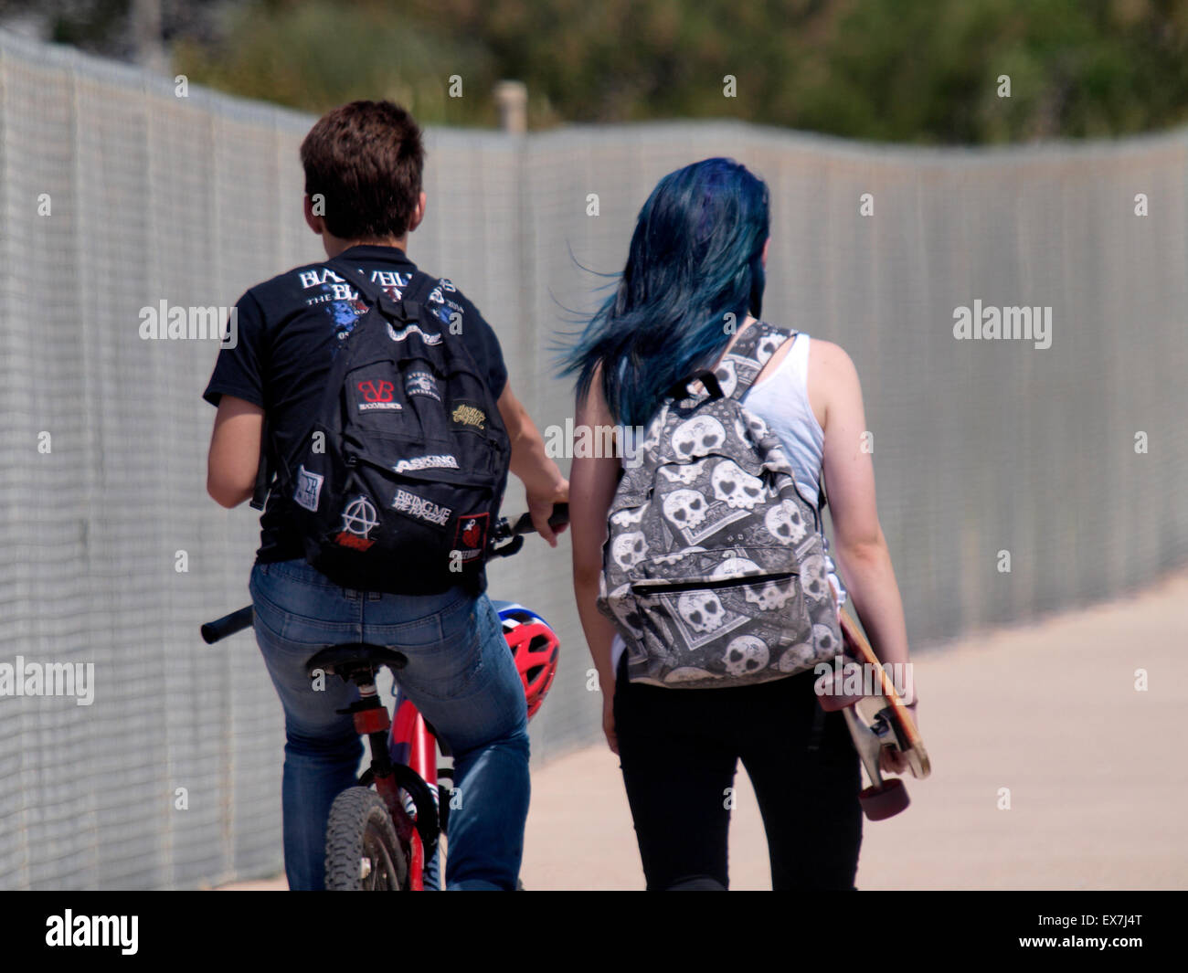 Teenage couple from behind, UK Stock Photo