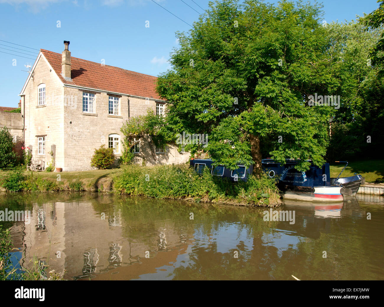 House with narrowboat mooring on the & Avon Canal near Bradford