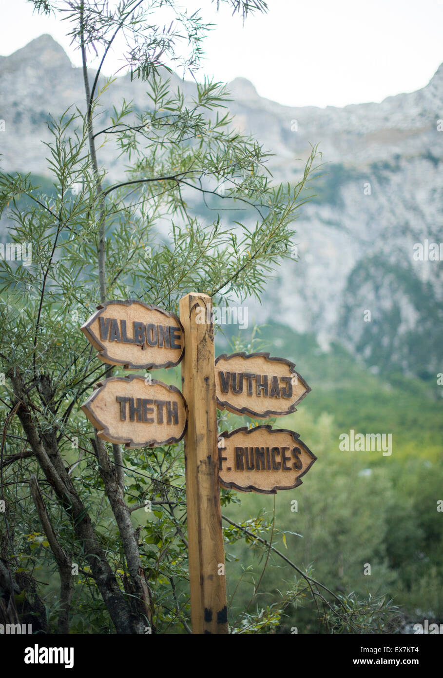 Hiking from Gusinje, Montenegro to Theth, Albania. This photo taken in  Albania newly made signs along the trail Stock Photo - Alamy