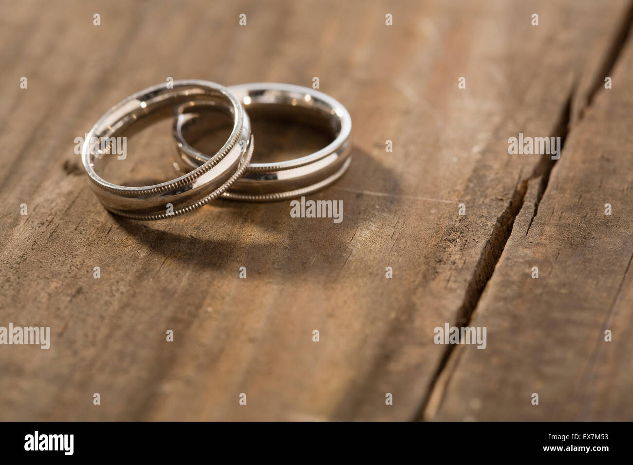 Wedding rings on table Stock Photo Alamy