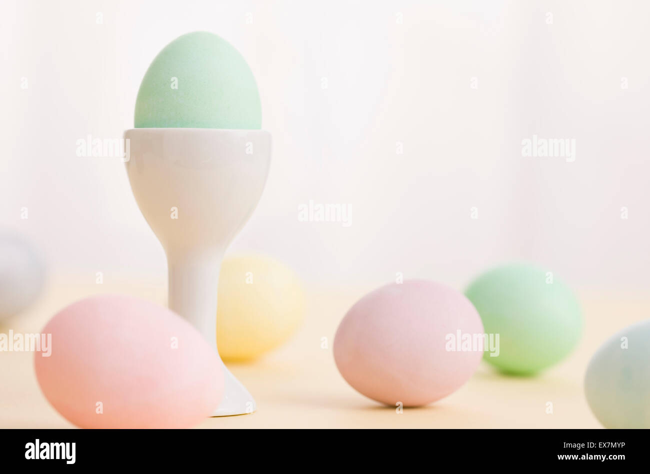 Easter eggs and eggcup Stock Photo