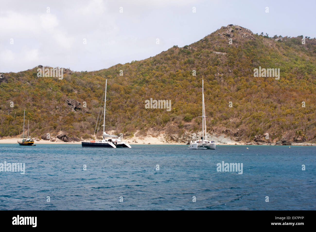 Colombier Beach, St. Barts with luxury sailboats in the foreground Stock Photo