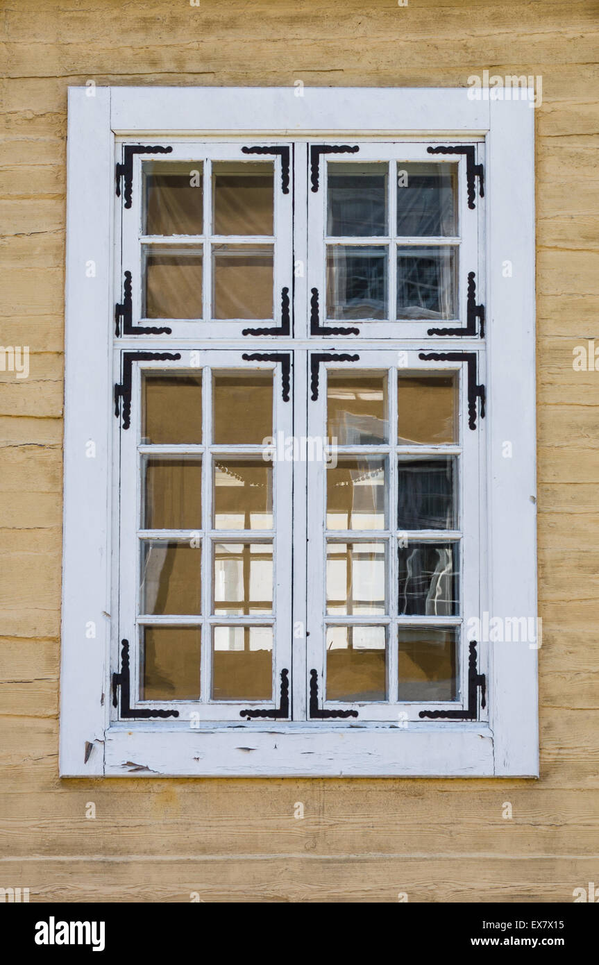 Vintage window on the wooden wall Stock Photo