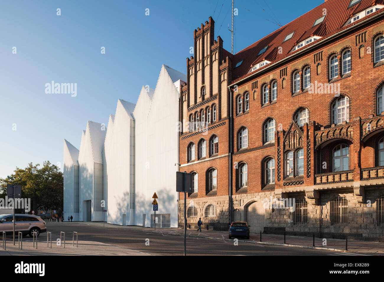 Perspective of adjacent and contrasting facades. Szczecin Philharmonic Hall, Szczecin, Poland. Architect: Estudio Barozzi Veiga, Stock Photo