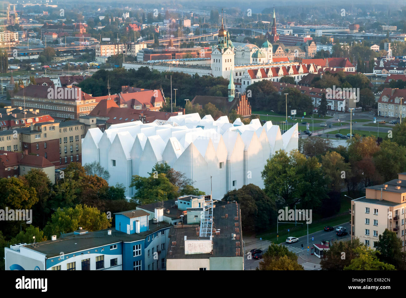View from above towards cityscape with philharmonic hall. Szczecin Philharmonic Hall, Szczecin, Poland. Architect: Estudio Baroz Stock Photo