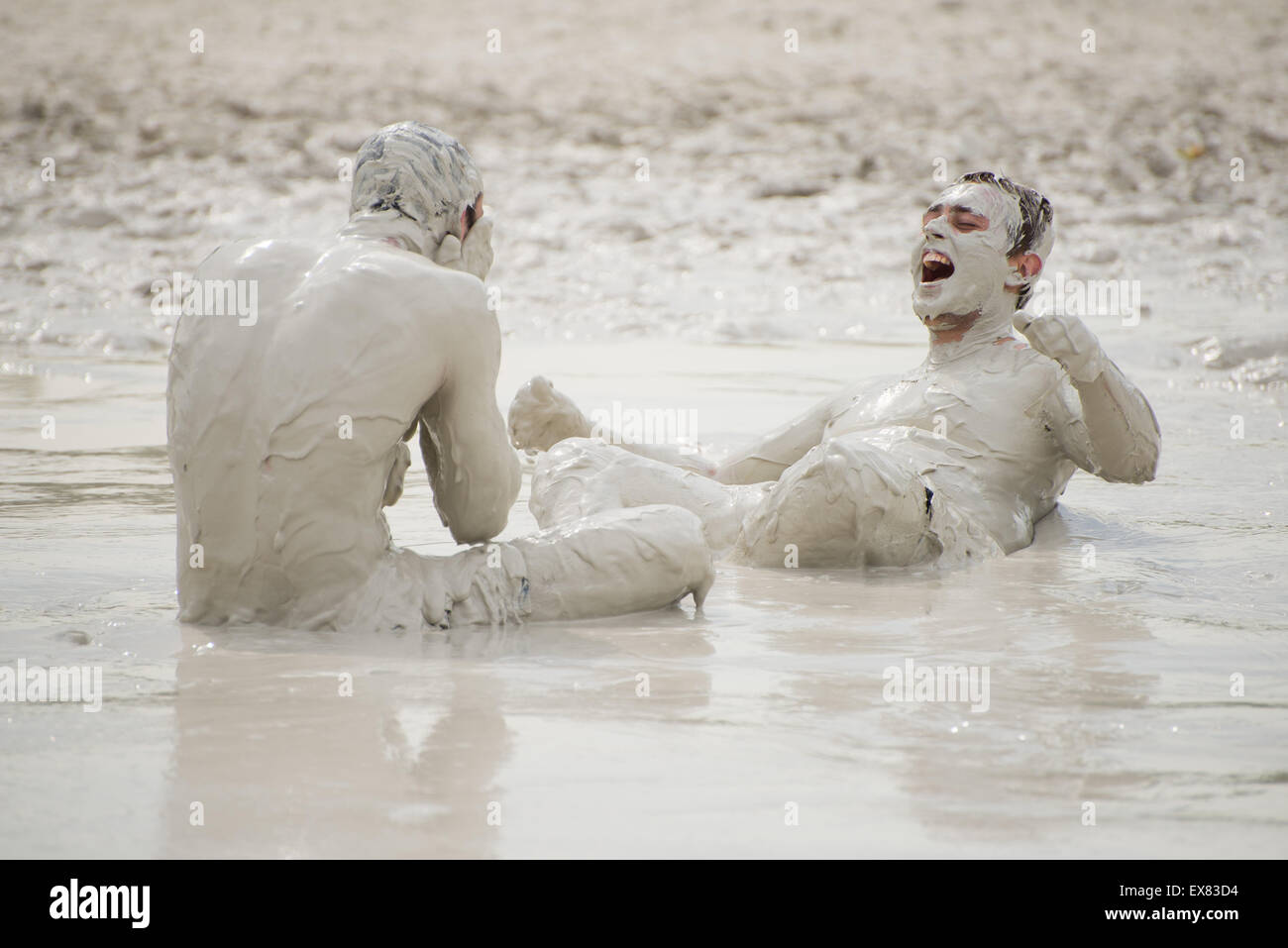 People enjoy hot weather and bathe in the mud pool with kaolin in quarry in village Jimlikov near Nova Role, Czech Republic, July 5, 2015. (CTK Photo/Martina Houdek) Stock Photo