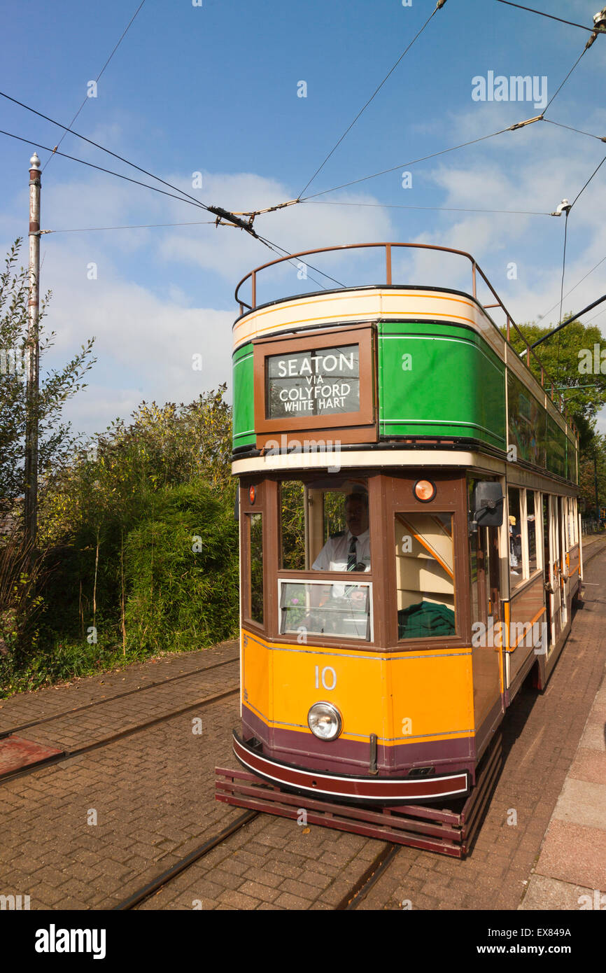 One of the many colourful replica trams at the Colyton terminus of the Seaton Tramway, Devon, England, UK Stock Photo