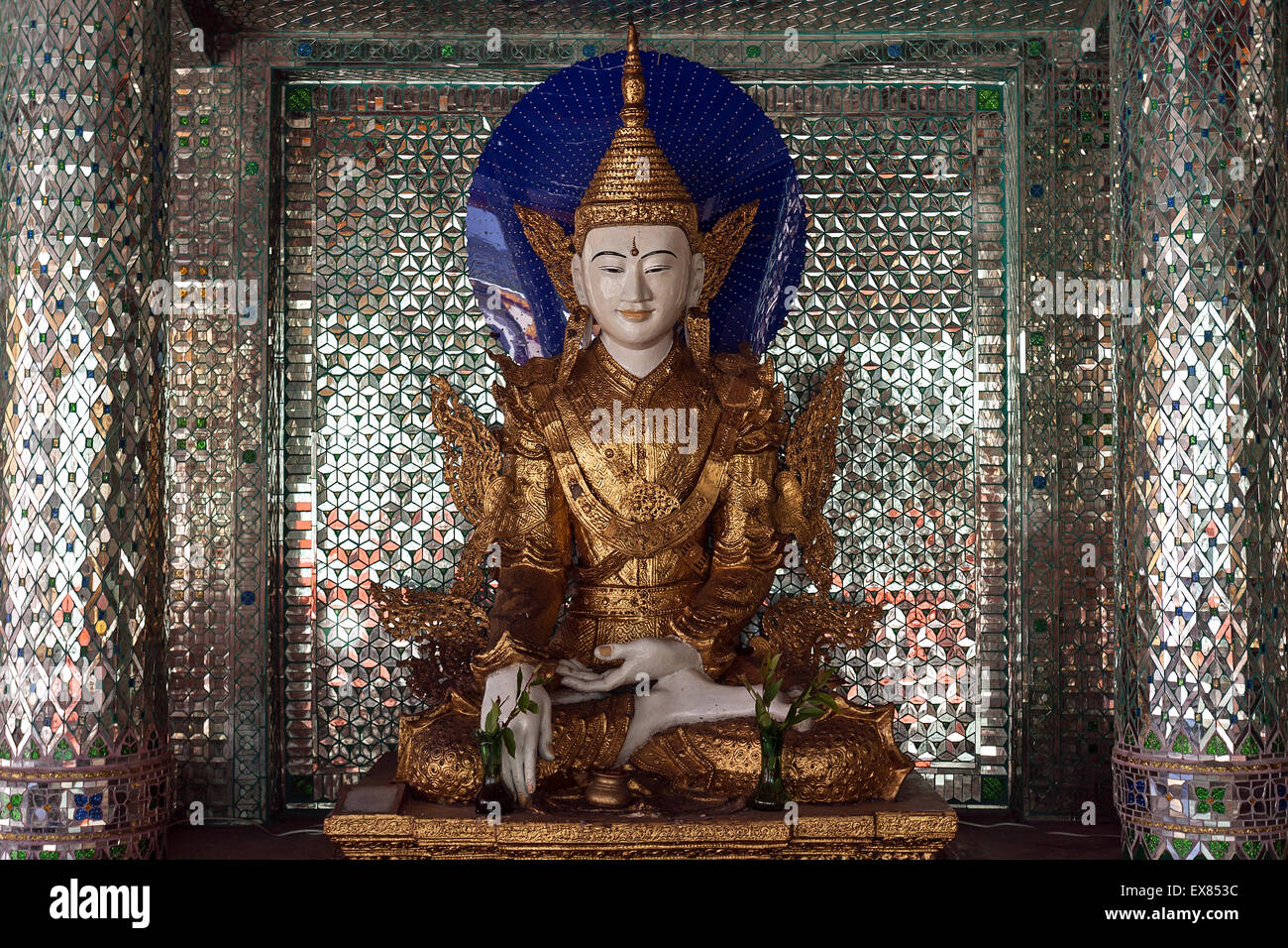 Buddha statue inside a shrine with mirror mosaic, Shwedagon Pagoda, Yangon,  Myanmar Stock Photo - Alamy