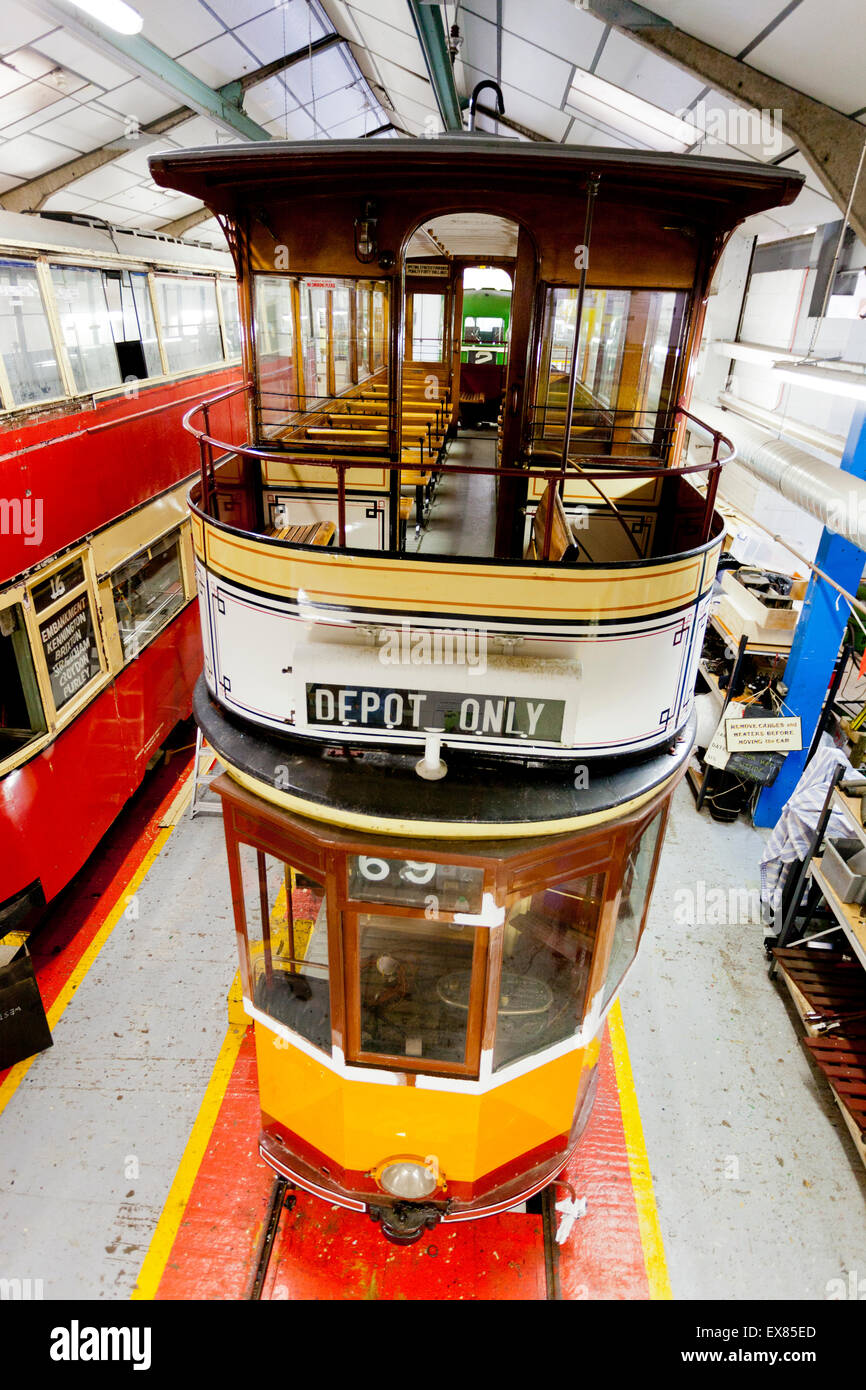 A Glasgow tram from 1922 in the workshops at the National Tramway Museum, Crich, Derbyshire, UK Stock Photo