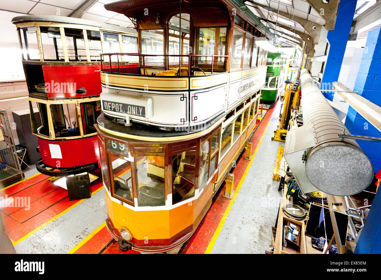 A Glasgow tram from 1922 in the workshops at the National Tramway Museum, Crich, Derbyshire, UK Stock Photo