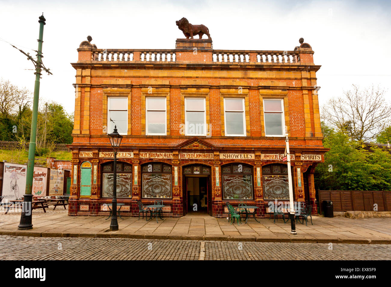 The rebuilt Red Lion Hotel on the cobbled street at the National Tramway Museum, Crich, Derbyshire, UK Stock Photo