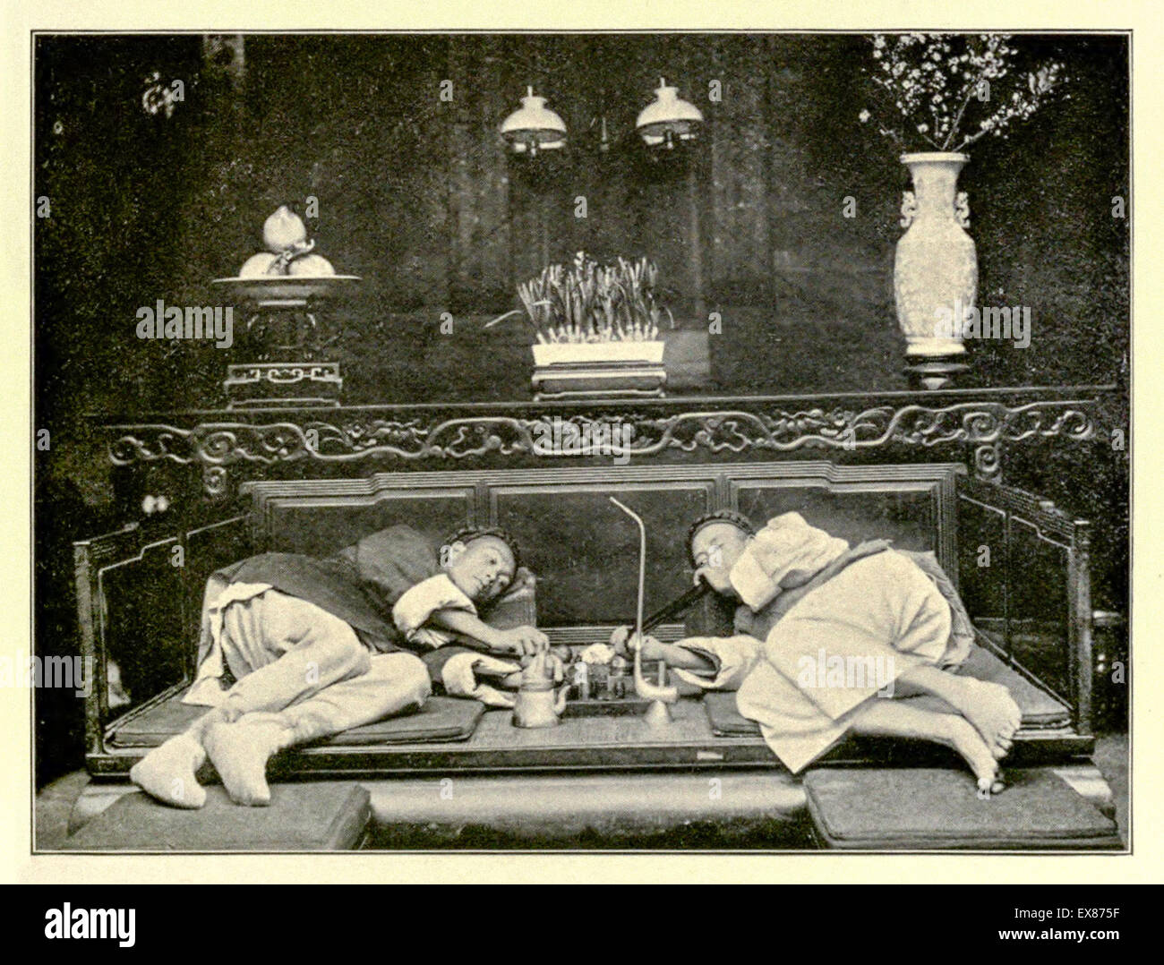 Wealthy Opium smokers in an upperclass Opium den in Shanghai city