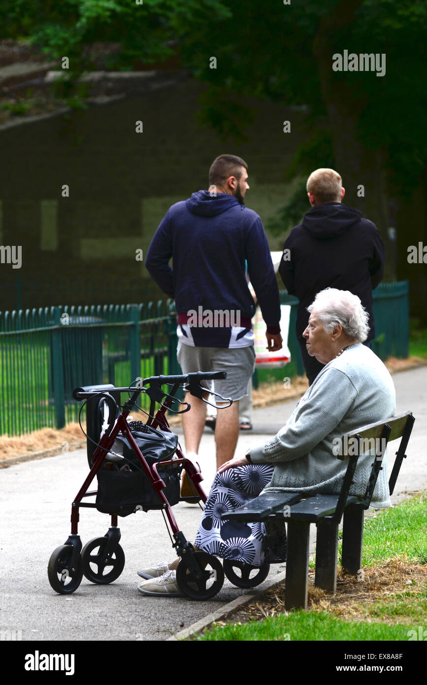 An elderly lady alone on a park bench. Picture: Scott Bairstow/Alamy Stock Photo