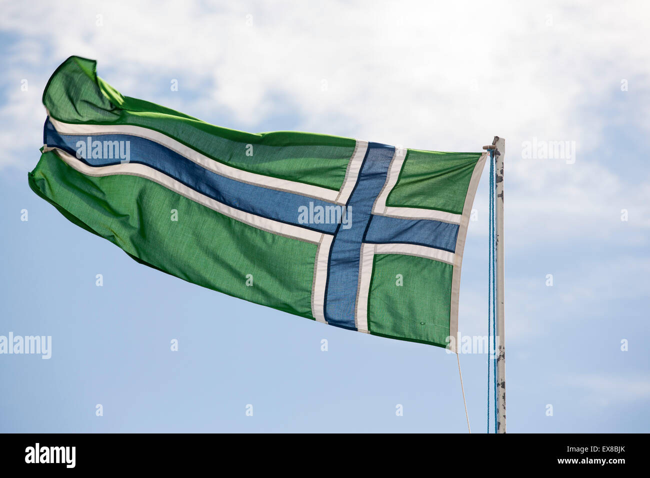 An Outer Hebrides flag flying in Tarbert on the Isle of Harris, Outer Hebrides, Scotland, UK. Stock Photo