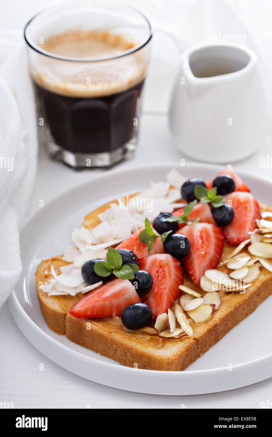 Toast with almond butter and toppings for breakfast Stock Photo Alamy