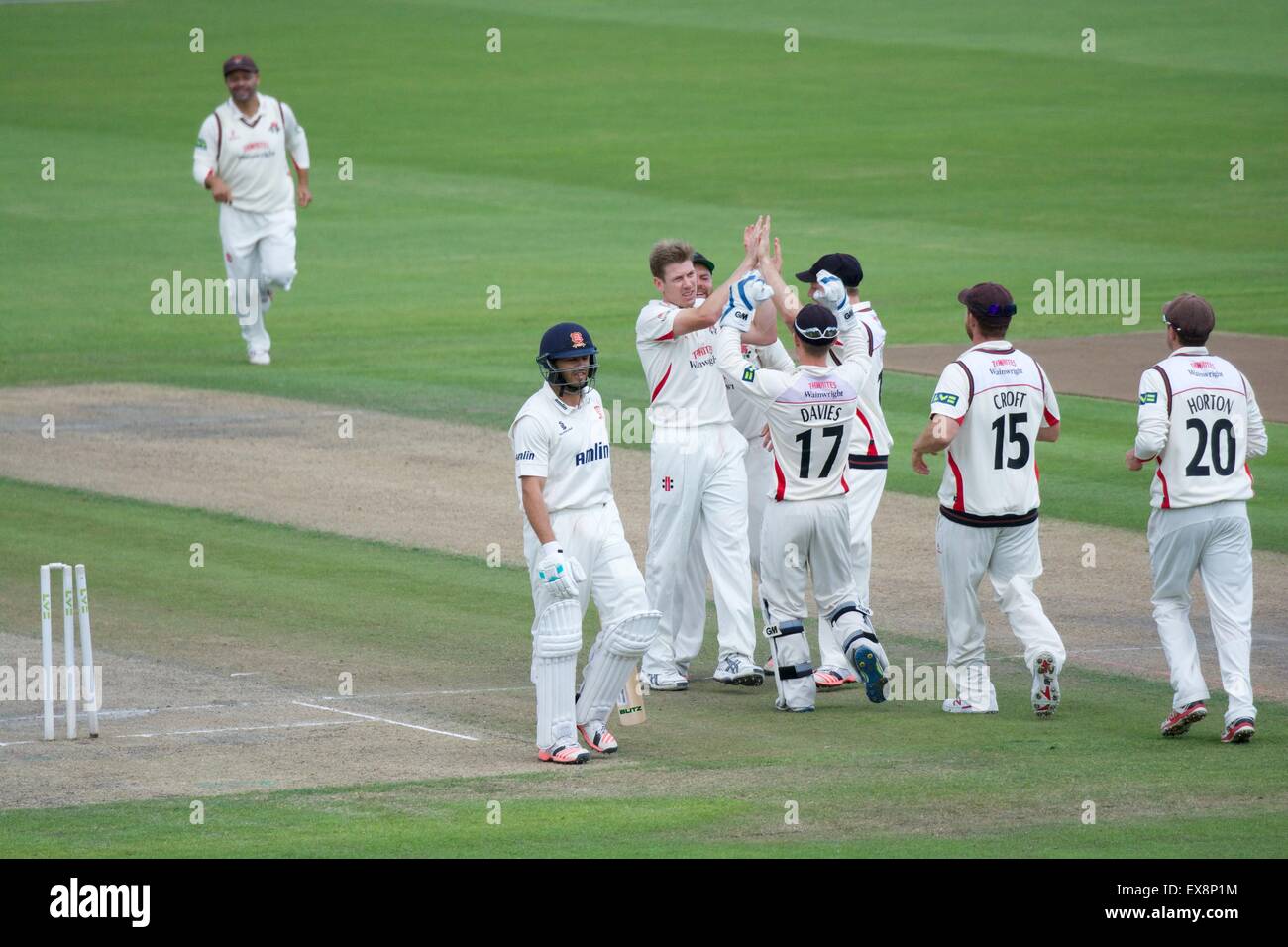 Manchester UK 9th July 2015  James Faulkner (Lancashire) celebrates his fifth wicket, bowling out Greg Smith for 3,  on the fourth day of the County Championship match between Lancashire and Essex at Emirates Old Trafford with Lancashire pressing for an unlikely win in a rain-affected match. Faulkner finished with five wickets. Cricket Lancashire v Essex Manchester, UK Credit:  John Fryer/Alamy Live News Stock Photo