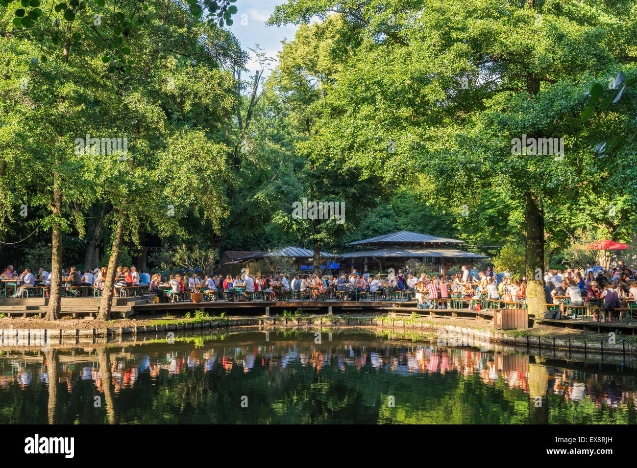 Busy beer garden in summer at Cafe am Neuen See in Tiergarten park in Berlin Germany Stock Photo