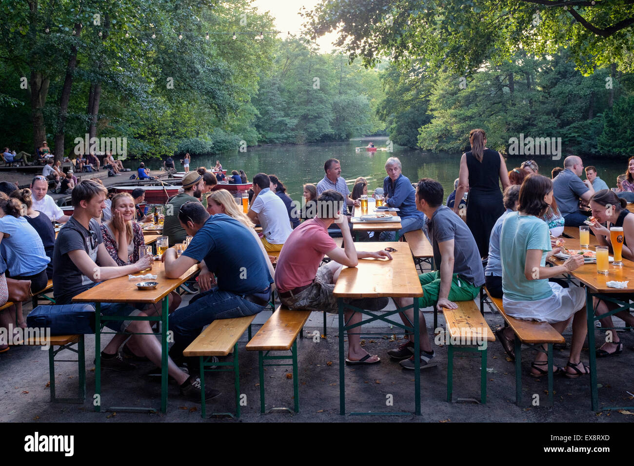 Busy beer garden in summer at Cafe am Neuen See in Tiergarten park in Berlin Germany Stock Photo