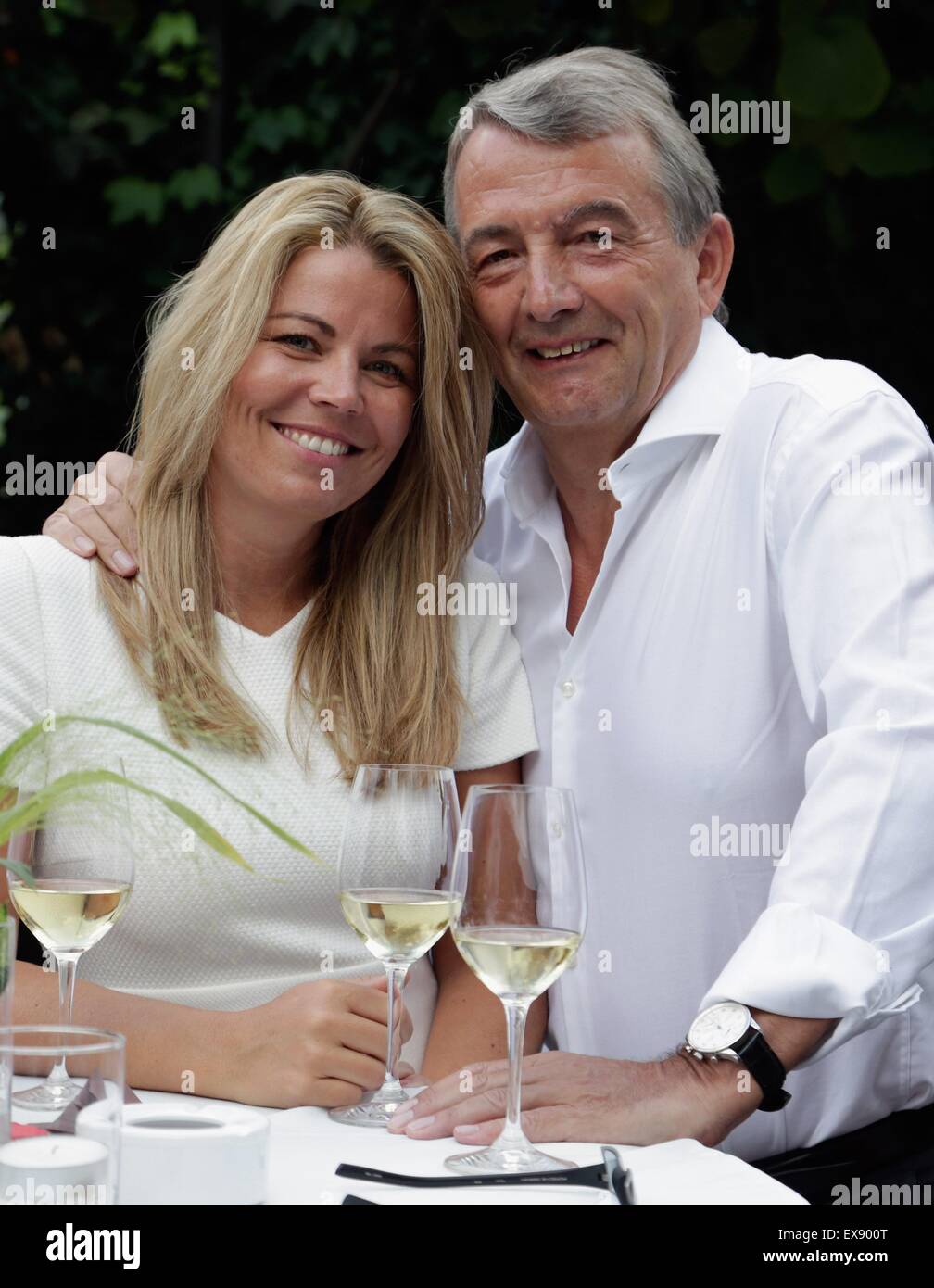 Bolzano, Italy. 8th July, 2015. HANDOUT - A handout picture made available on 08 July 2015 of Wolfgang Niersbach (R) and his girl friend Marion Popp attend the 2nd evening of the FIFA World Champions of 1990 meeting at Hotel Seeleiten (Kaltern - Caldaro) on July 8, 2015 in Bolzano, Italy. Germany defeated Argentina 1-0 in the 1990 FIFA World Cup final at the Olympic stadium in Rome, Italy, on 08 July 1990. Photo: JOHANNES SIMON/dpa (ATTENTION EDITORS: FOR EDITORIAL USE ONLY IN CONNECTION WITH MANDATORY CREDIT: Photo: Johannes Simon/Bongarts/Getty Images/dpa)/dpa/Alamy Live News Stock Photo