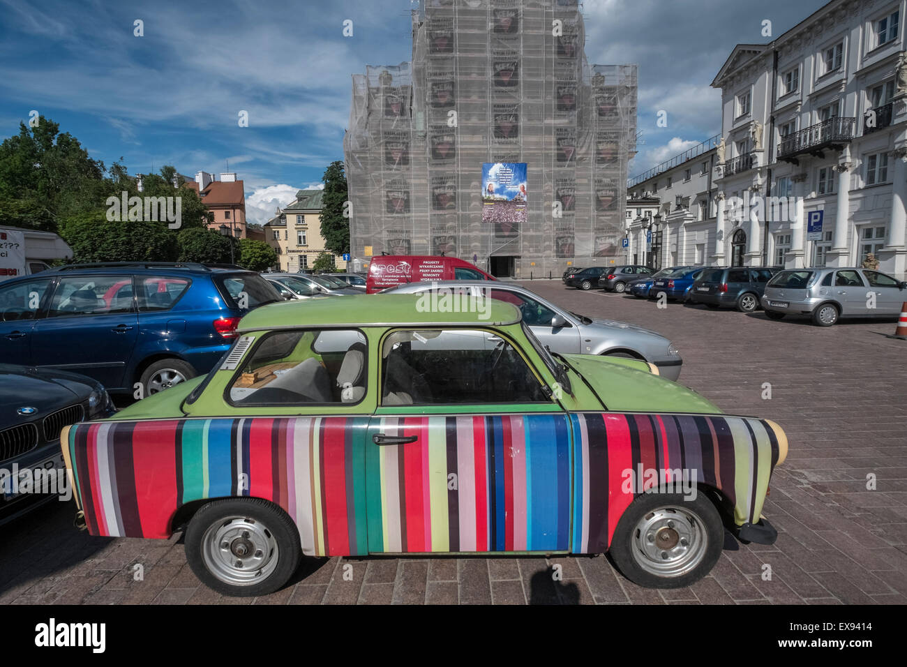 Old Trabant car with multi coloured striped side panel, Warsaw, Poland Stock Photo