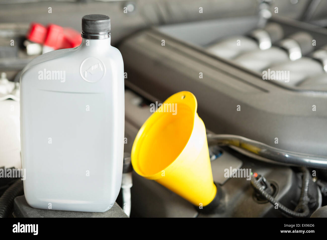 Plastic oil bottle on car Stock Photo Alamy