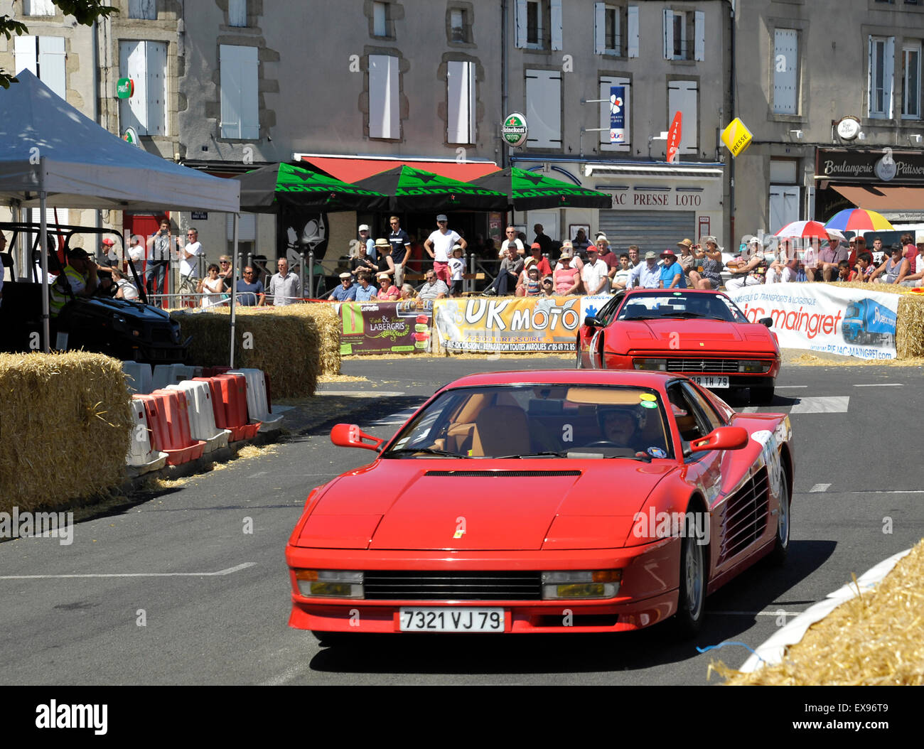 Ferrari Testarossa and 328 GTB racing at the Bressuire historic grand prix France Stock Photo